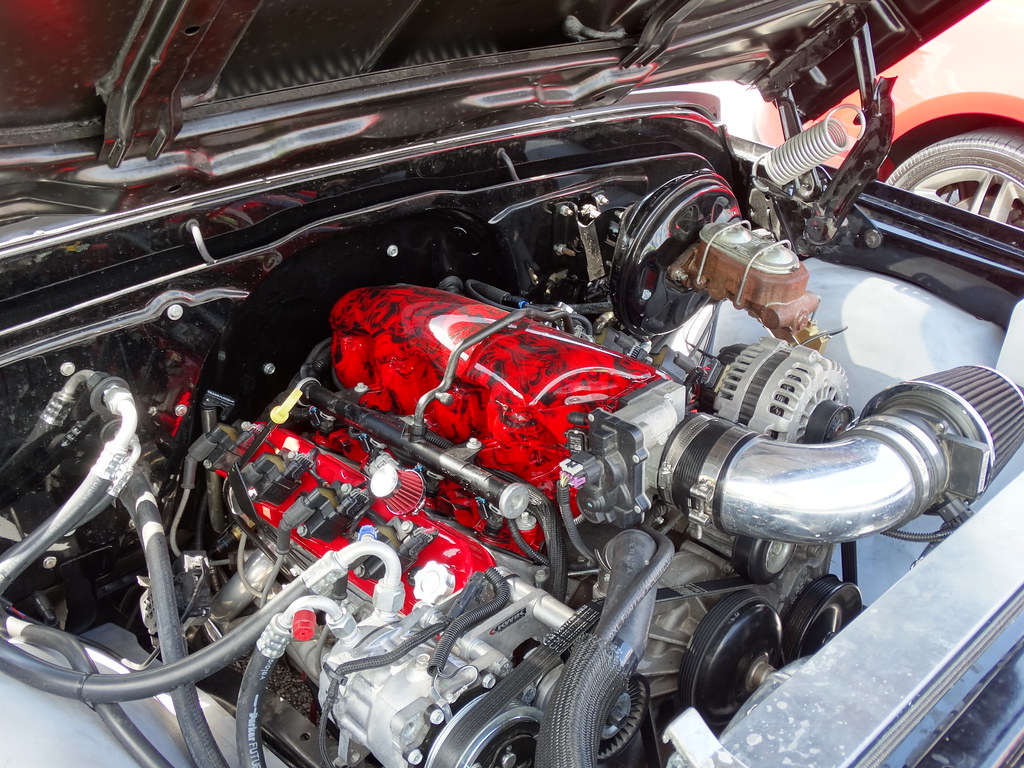 A built V8 truck engine visible under an open hood, the type of engine platform used for turbocharger conversions