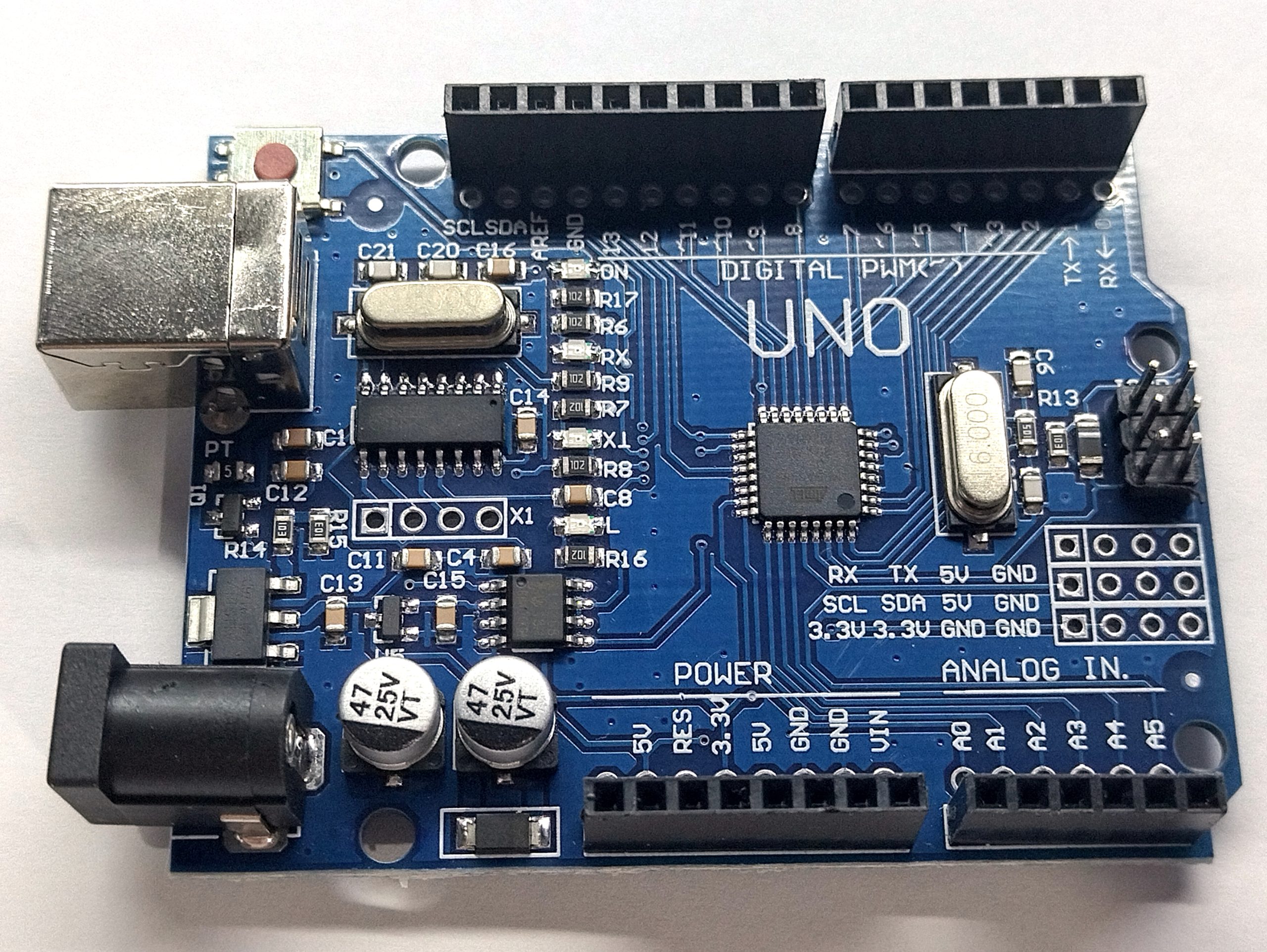 Close-up of an Arduino Uno microcontroller board.