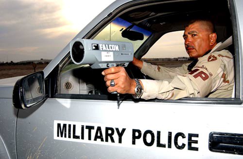Handheld K-band radar gun used for measuring vehicle speed.